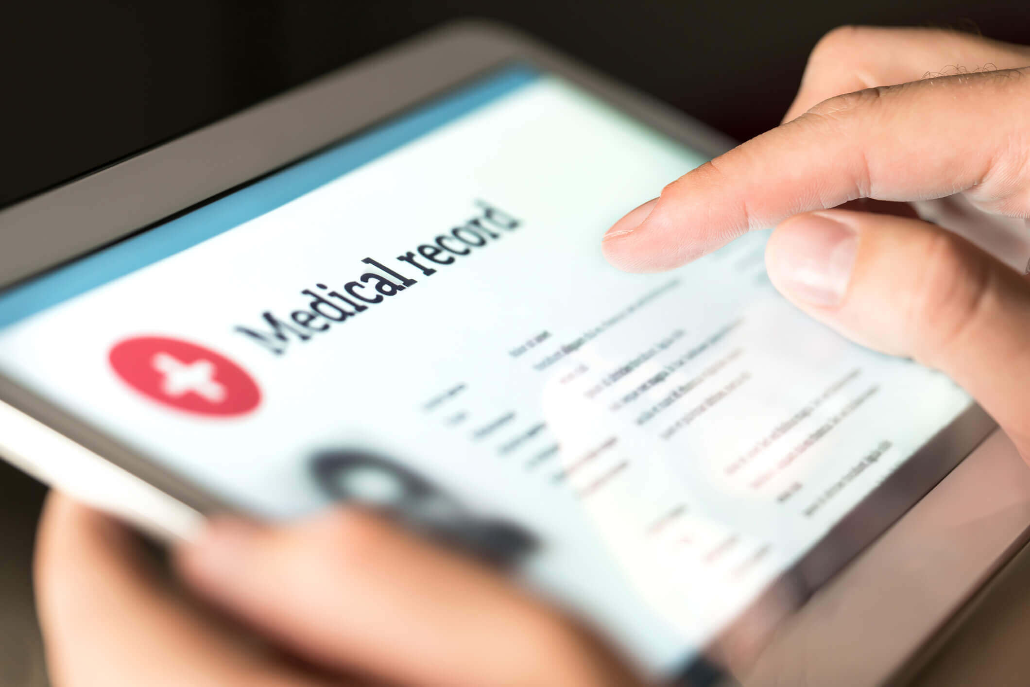 man filling patient forms