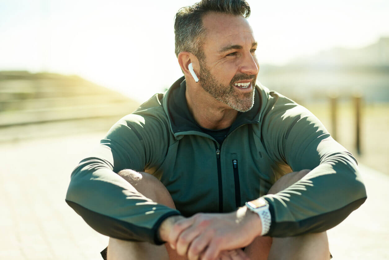 Mature man sitting down 